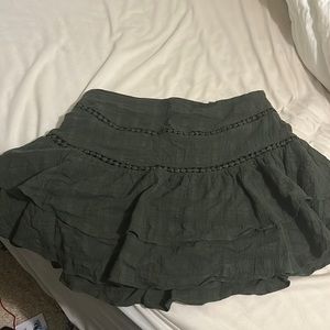Army green mini skirt.